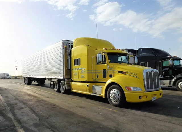 transport, automobile, truck, vehicle, trailer, yellow, car park, truck truck, truck american, truck, truck, truck, truck, truck, trailer, trailer. Junk removal workflow: five handoffs where jobs go wrong