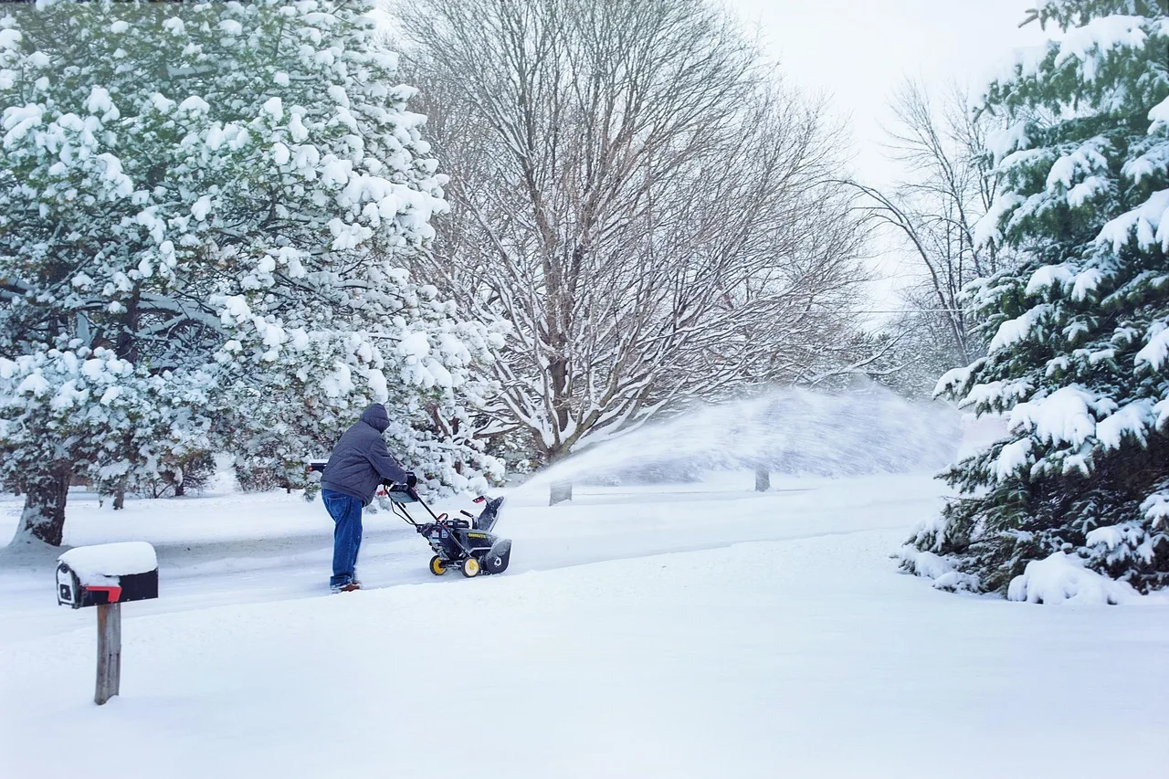 snow, snow blowing, snowblower, snow removal, weather, winter, cold, blower, outdoors, nature, season, snowstorm. Winter operations for junk removal crews in the Prairie provinces
